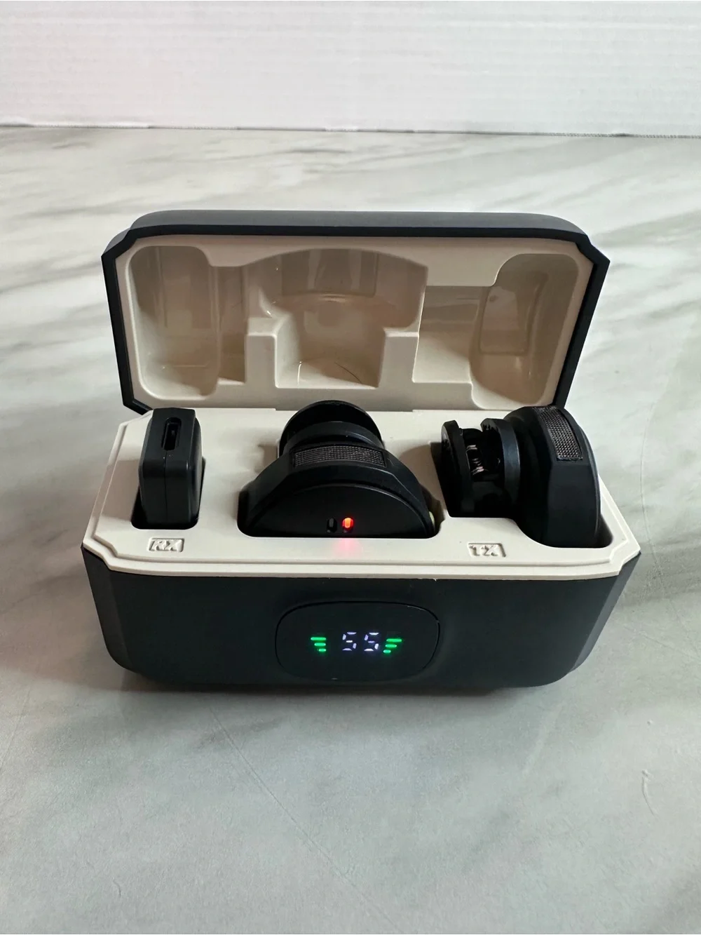 Wireless Earbud Charging Case with Three Black Earbuds